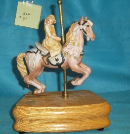 Girl On A Carousel Horse