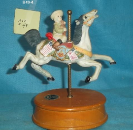 Boy on Carousel Horse