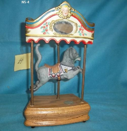 T. Fraley Dentzel cat with a rounding board