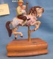 Dad & Child on A Carousel Horse