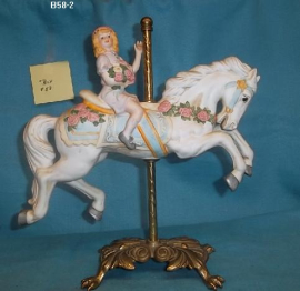 Girl on White Carousel Horse